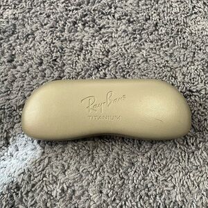 Lightly used silver Ray-Ban titanium eyeglasses case